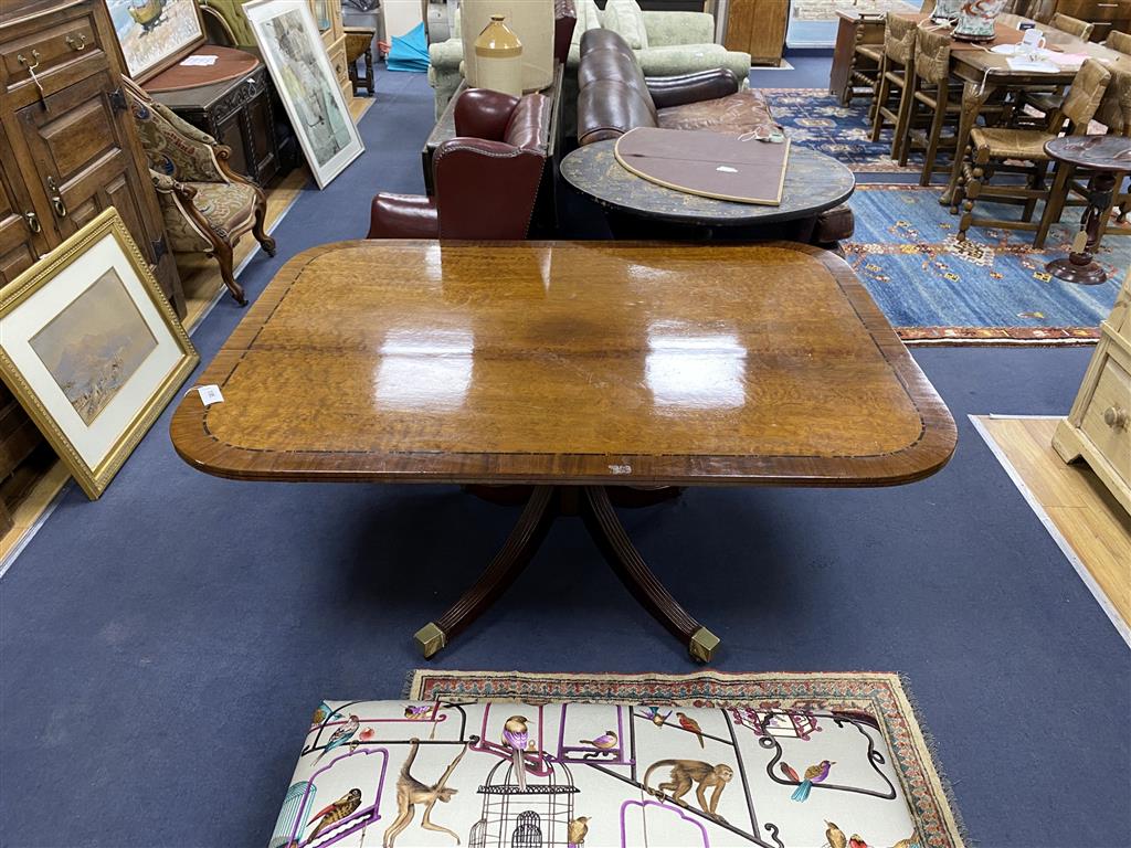 A George III banded mahogany rectangular breakfast table (a.f.), width 145cm, depth 110cm, height 72cm